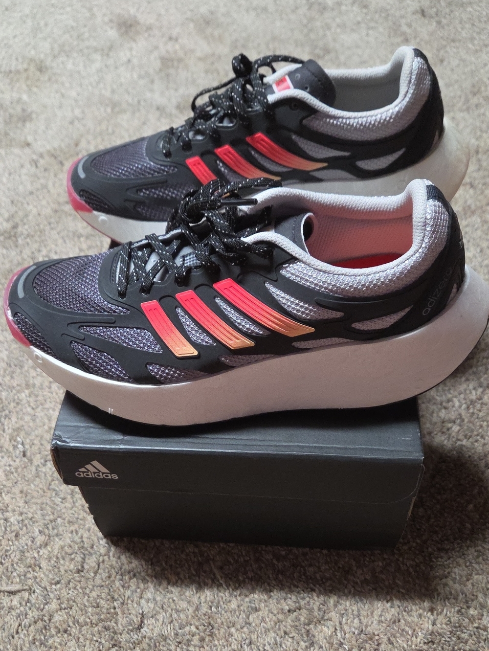 adidas Women’s Black Sneakers with Coral-Orange Accents